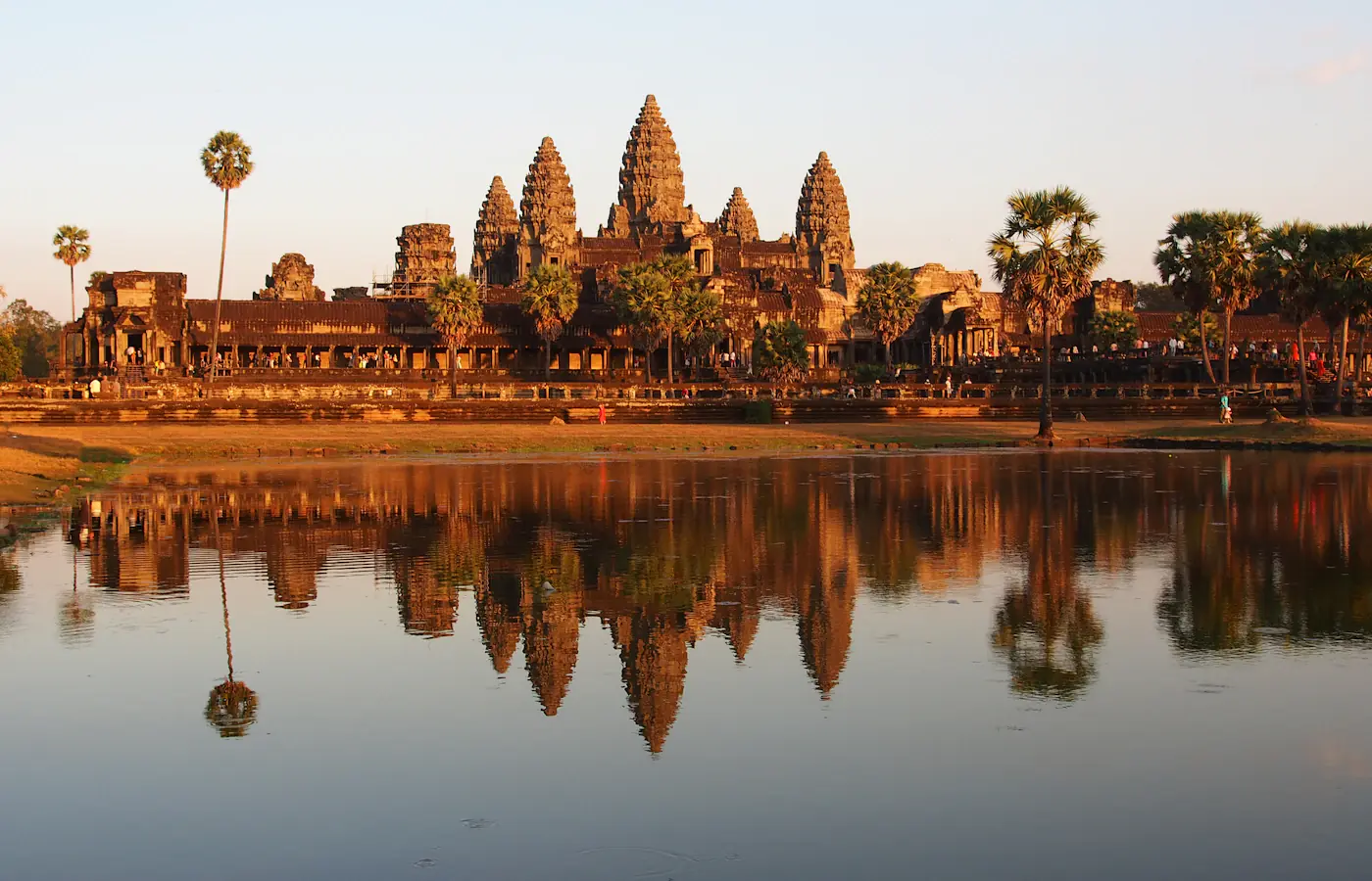 The towers of Angkor Wat reflected in water near Siem Reap, Cambodia
