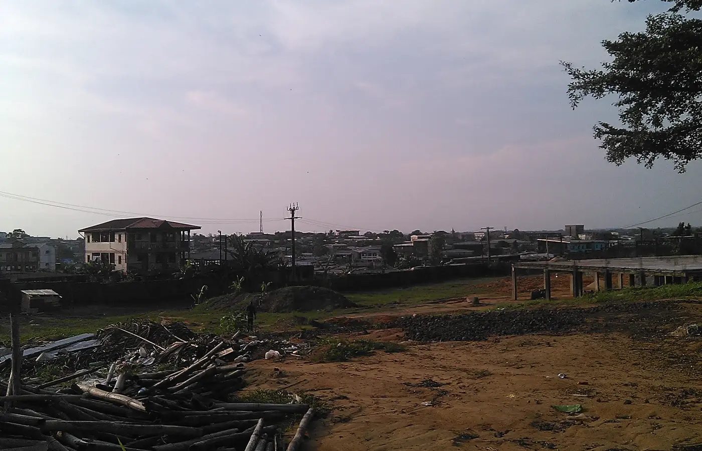 Buildings and open ground looking southwest across Douala in Cameroon