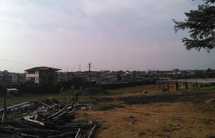 Buildings and open ground looking southwest across Douala in Cameroon