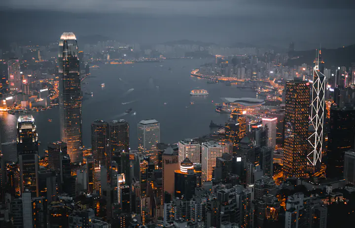 Panorama de Hong Kong e Victoria Harbour à noite