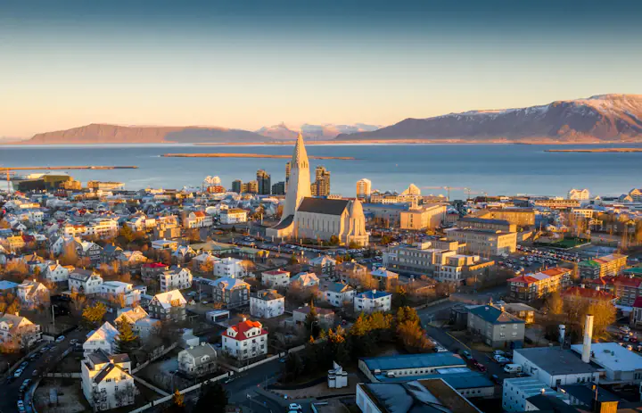 Aerial view of Reykjavík buildings and streets in Iceland at sunrise