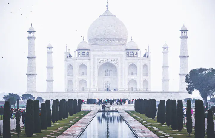 The Taj Mahal in Agra seen across its garden reflecting pool.