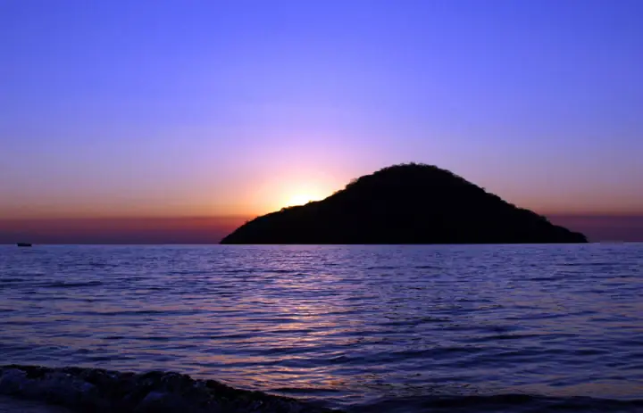 Sunset behind Thumbi Island on Lake Malawi, seen from Cape Maclear.