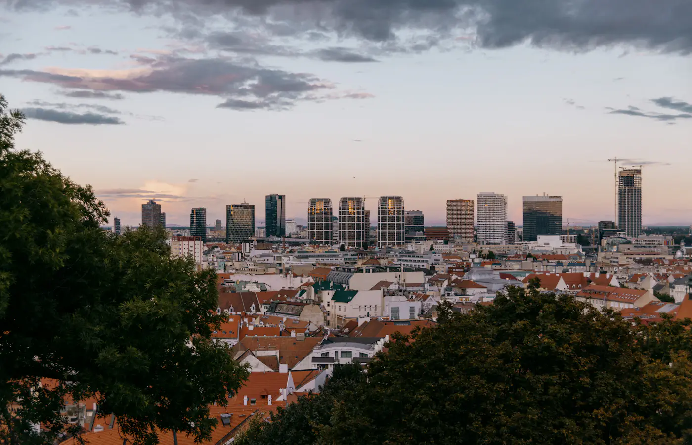 Red rooftops and the modern skyline of Bratislava viewed from the castle hill in Slovakia