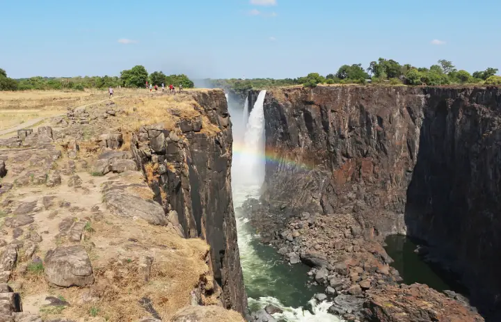 Victoria Falls gorge and a rainbow photographed from the Zimbabwe side